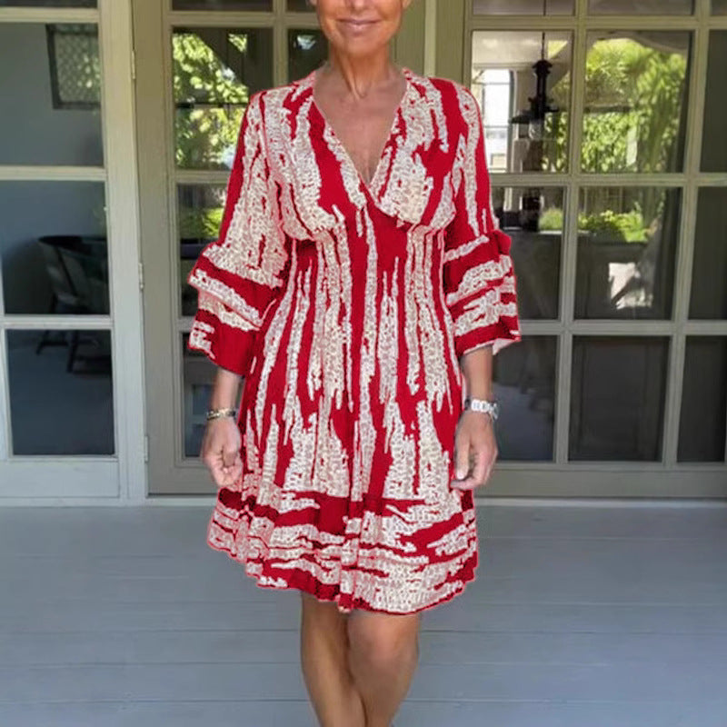 Damen midikjol med lekfullt mönster och eleganta 3/4-ärmar Mirla-Eva Jonsson
