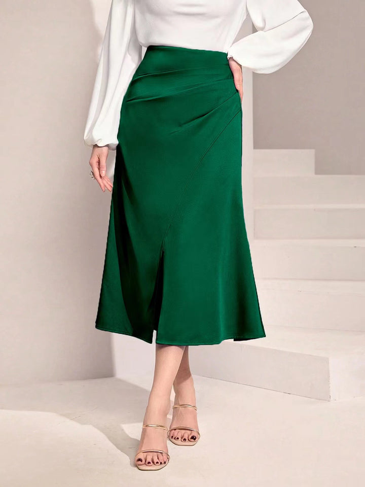 Damen midiskirt med asymmetrisk snitt och elegant slits Mirla-Eva Jonsson