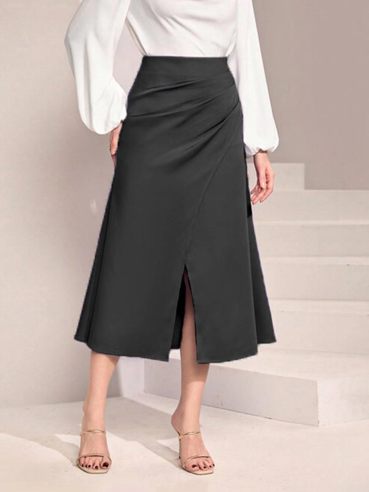 Damen midiskirt med asymmetrisk snitt och elegant slits Mirla-Eva Jonsson