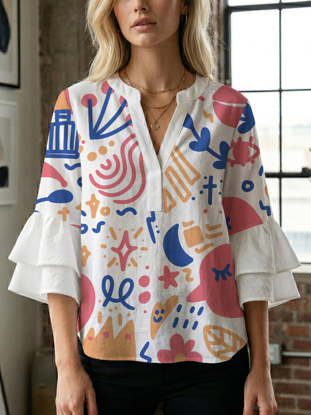 Damen modisches Oberteil mit Rüschendetails und kreativem Muster Mirla-Eva Jonsson
