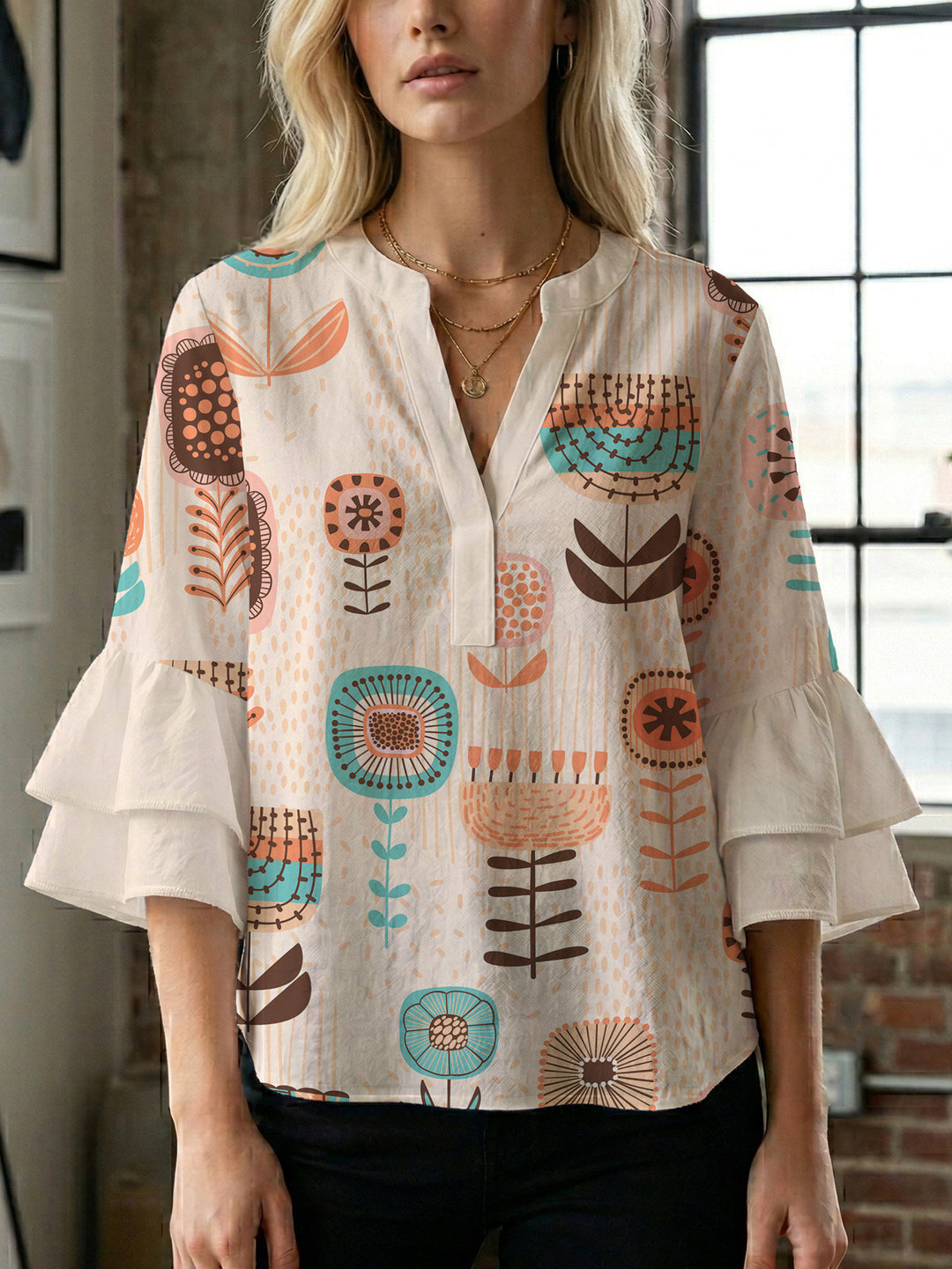 Damen modisches Oberteil mit Rüschendetails und kreativem Muster Mirla-Eva Jonsson
