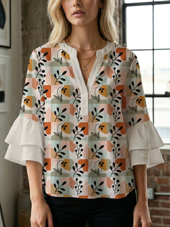 Damen modisches Oberteil mit Rüschendetails und kreativem Muster Mirla-Eva Jonsson