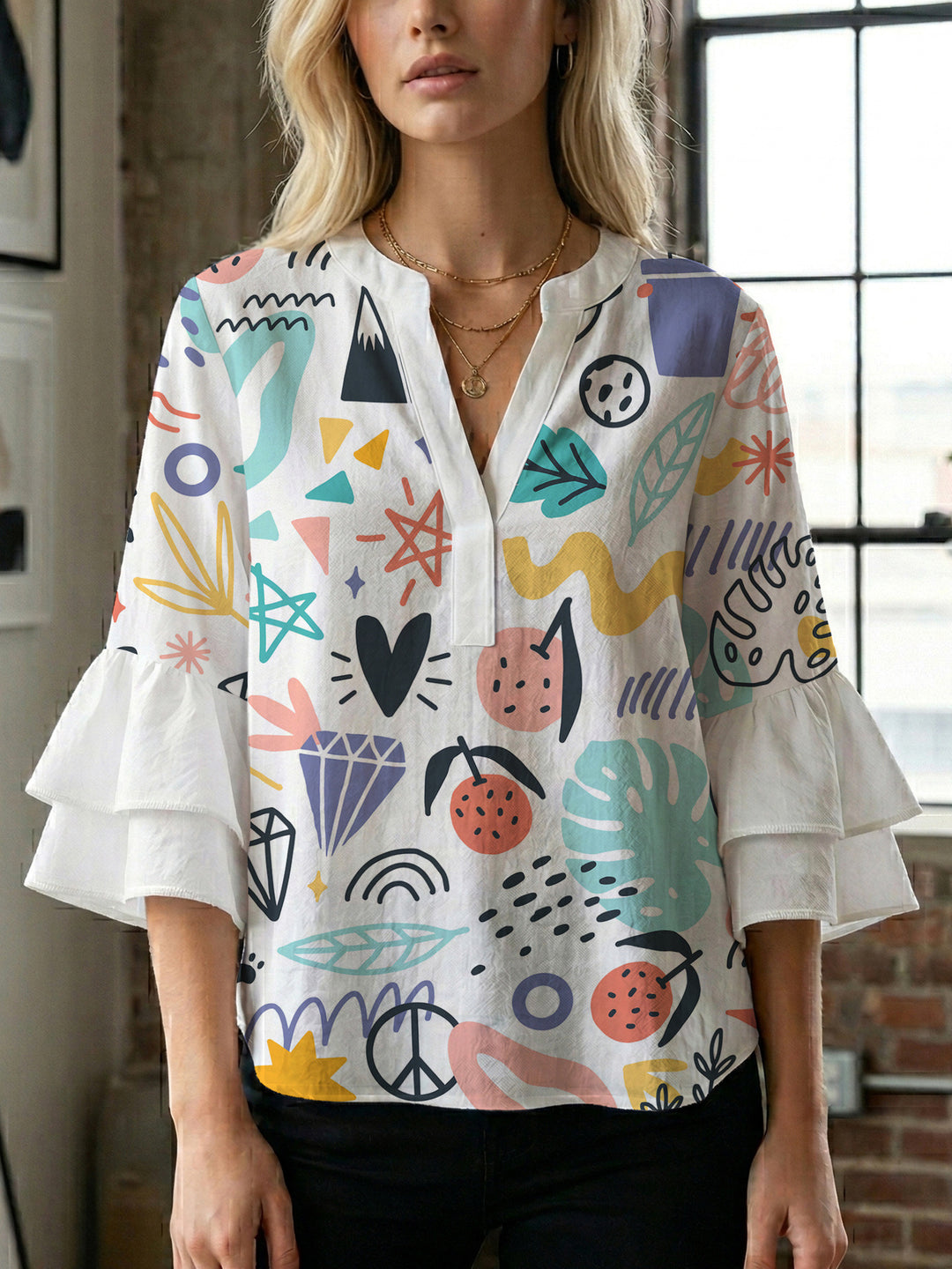 Damen modisches Oberteil mit Rüschendetails und kreativem Muster Mirla-Eva Jonsson