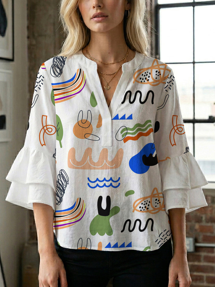 Damen modisches Oberteil mit Rüschendetails und kreativem Muster Mirla-Eva Jonsson