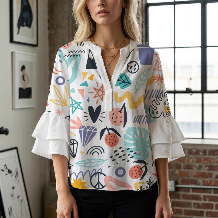 Damen modisches Oberteil mit Rüschendetails und kreativem Muster Mirla-Eva Jonsson