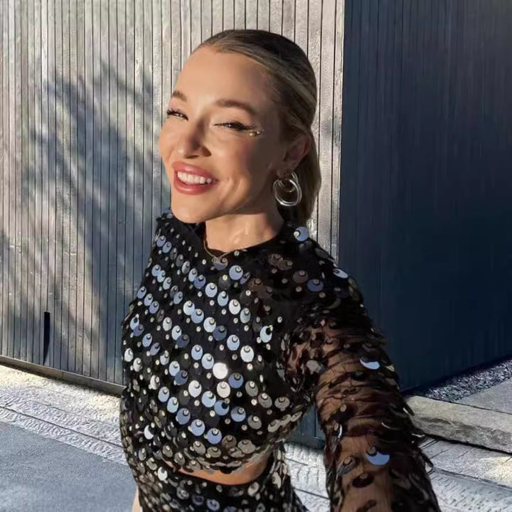 Damen modiskt miniklänning med genomskinliga ärmar och paljettdekoration Mirla-Eva Jonsson
