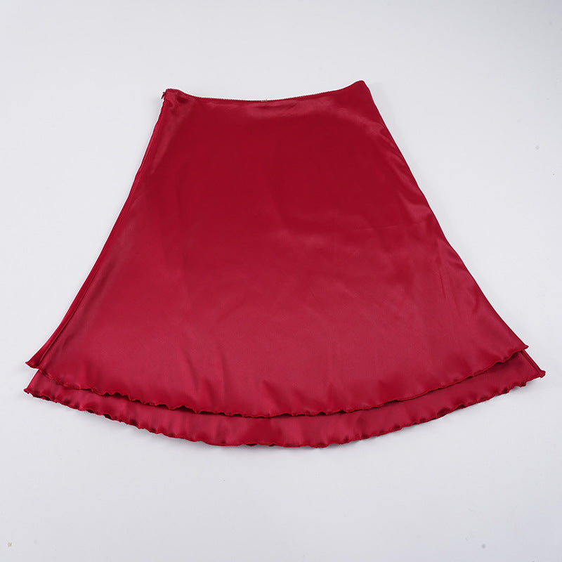 Damen satin skirt with voluminous ruffle hem and elastic waistband Mirla-Eva Jonsson