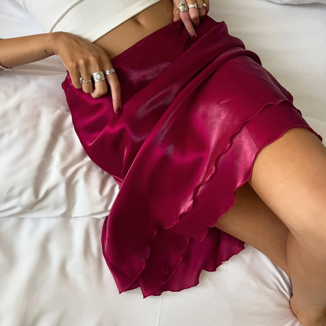 Damen satin skirt with voluminous ruffle hem and elastic waistband Mirla-Eva Jonsson