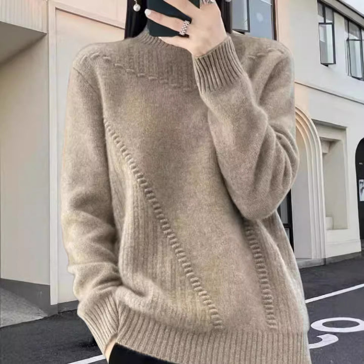Damen stickad tröja med elegant ståkrage och strukturerad design Mirla-Eva Jonsson