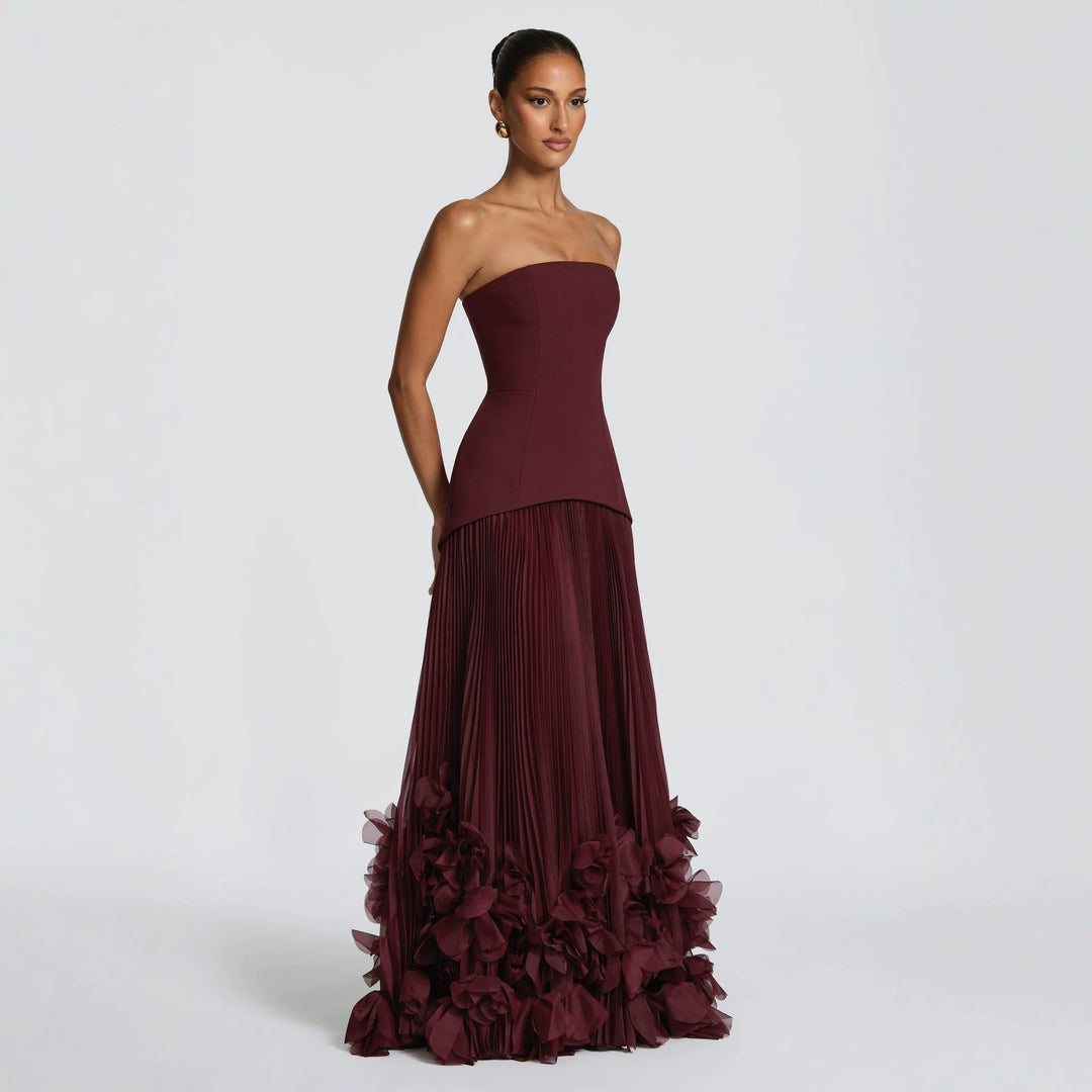 Damen strapless maxikjol med flytande kjol och blommig detalj Mirla-Eva Jonsson