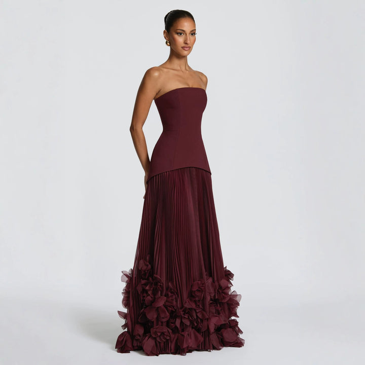 Damen strapless maxikjol med flytande kjol och blommig detalj Mirla-Eva Jonsson