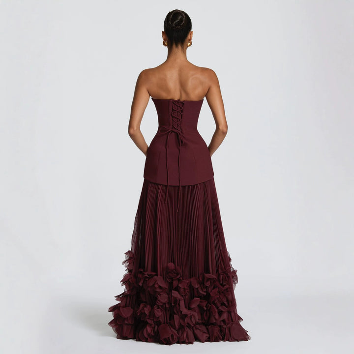 Damen strapless maxikjol med flytande kjol och blommig detalj Mirla-Eva Jonsson