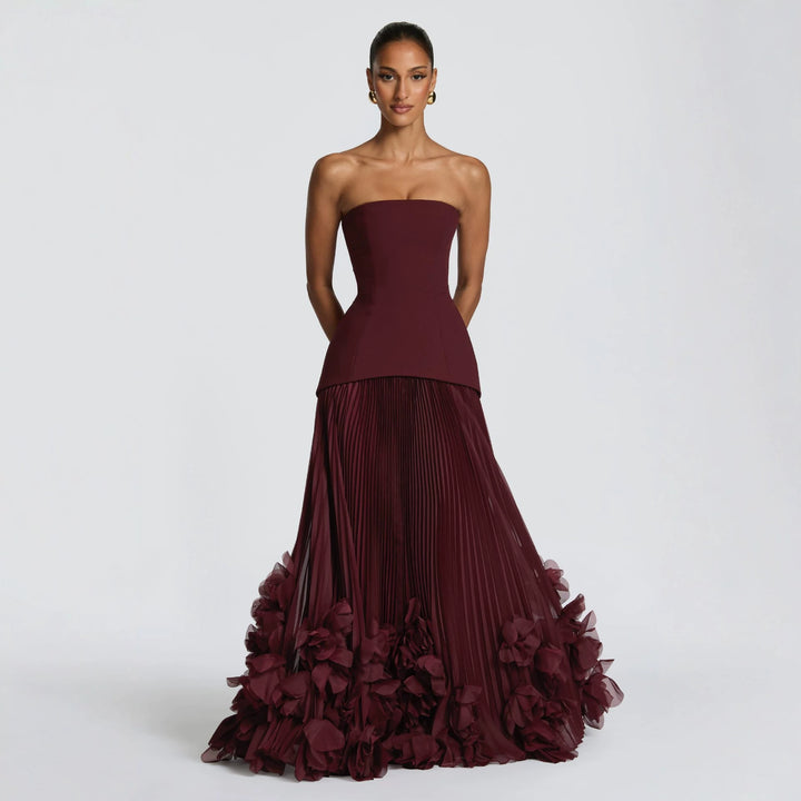 Damen strapless maxikjol med flytande kjol och blommig detalj Mirla-Eva Jonsson