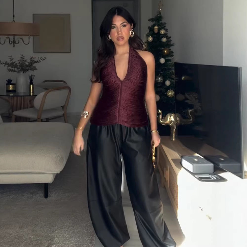 Damen stylish halter top with deep V-neck and ruffle details Mirla-Eva Jonsson
