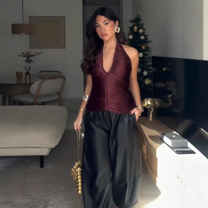 Damen stylish halter top with deep V-neck and ruffle details Mirla-Eva Jonsson