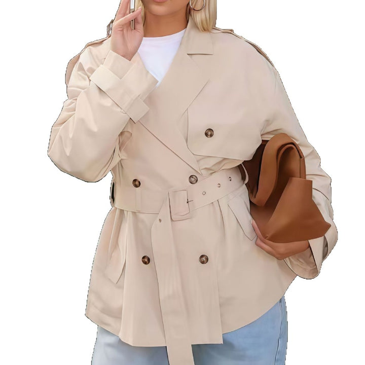 Damen trenchcoat med moderiktig skärning och figursydd silhuett Eva Jonsson-Eva Jonsson