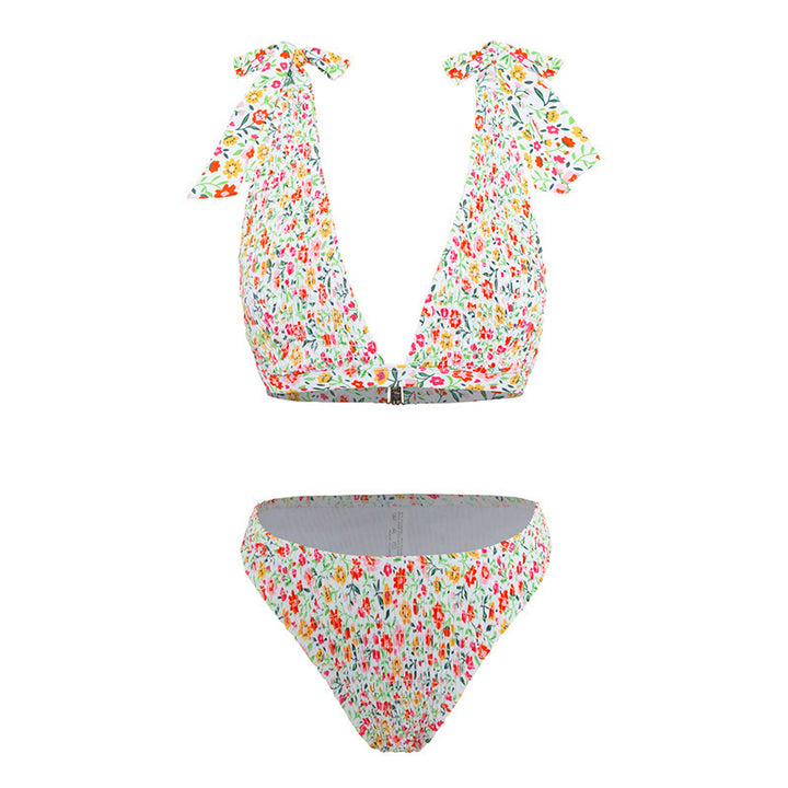 Damen triangel-bikini med lekfulla slingor och blommönster Mirla-Eva Jonsson