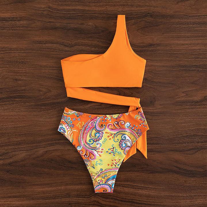 Damen triangel-bikini med modernt asymmetriskt överdel och hög midja Mirla-Eva Jonsson