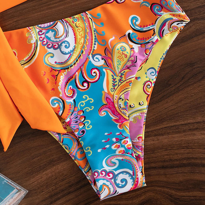 Damen triangel-bikini med modernt asymmetriskt överdel och hög midja Mirla-Eva Jonsson