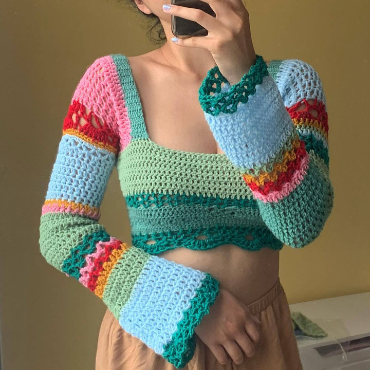 Damen virkad crop-top med långa ärmar och udda nederkant Mirla-Eva Jonsson