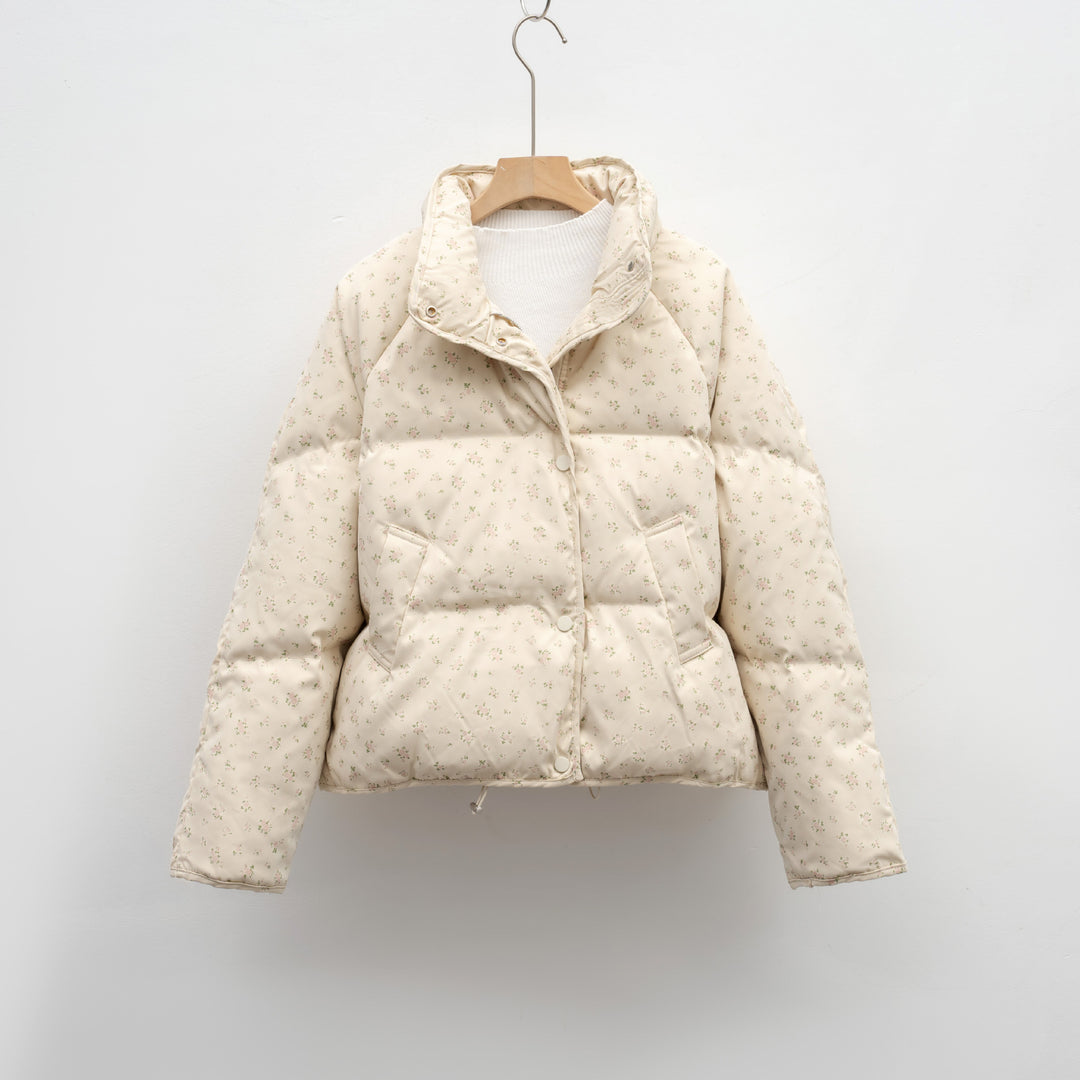 Damen voluminöse Steppjacke mit floralem Design und praktischen Taschen Mirla-Eva Jonsson
