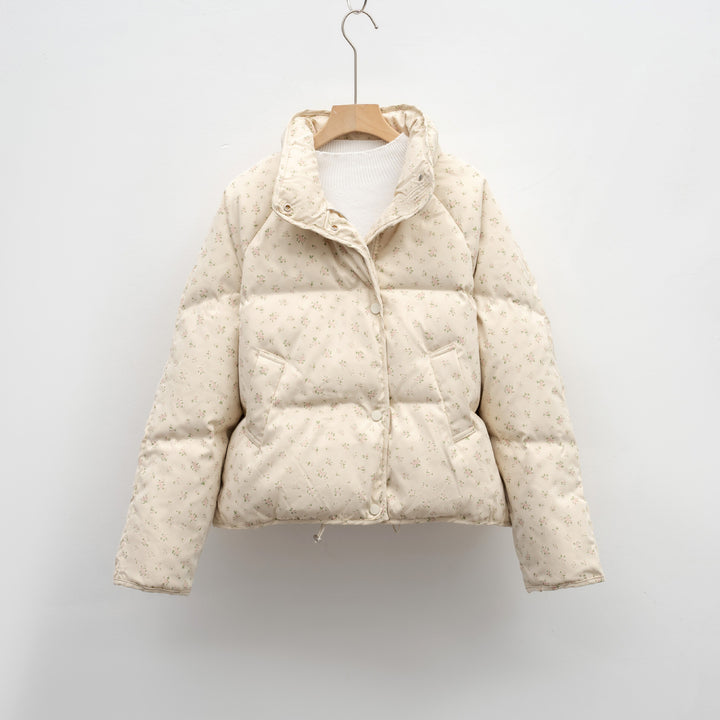 Damen voluminöse Steppjacke mit floralem Design und praktischen Taschen Mirla-Eva Jonsson