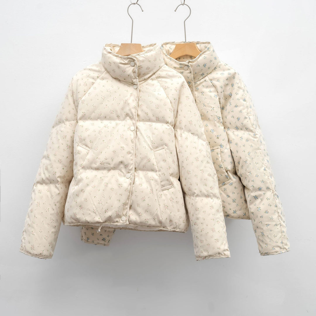 Damen voluminöse Steppjacke mit floralem Design und praktischen Taschen Mirla-Eva Jonsson