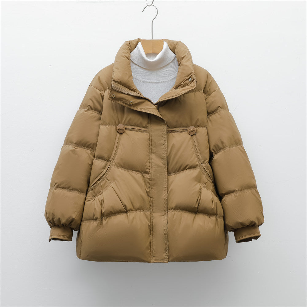 Damen voluminöse Winterjacke mit praktischen Taschen und hochschließendem Kragen Mirla-Eva Jonsson