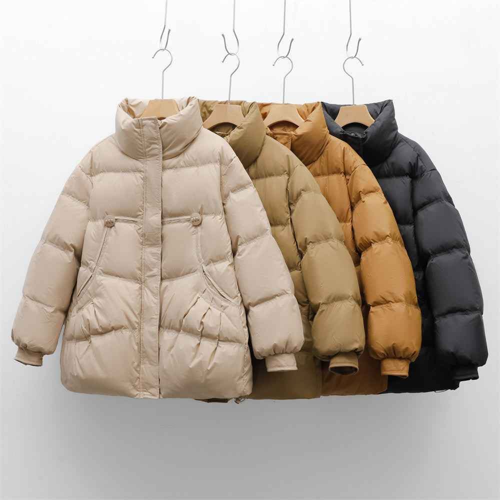 Damen voluminöse Winterjacke mit praktischen Taschen und hochschließendem Kragen Mirla-Eva Jonsson