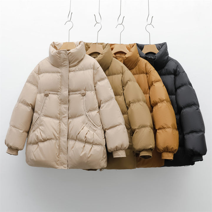 Damen voluminöse Winterjacke mit praktischen Taschen und hochschließendem Kragen Mirla-Eva Jonsson