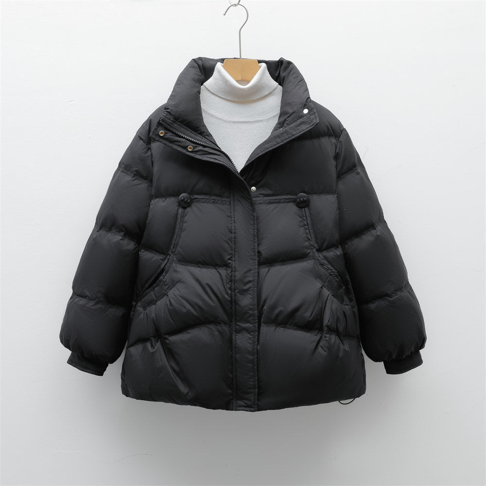 Damen voluminöse Winterjacke mit praktischen Taschen und hochschließendem Kragen Mirla-Eva Jonsson