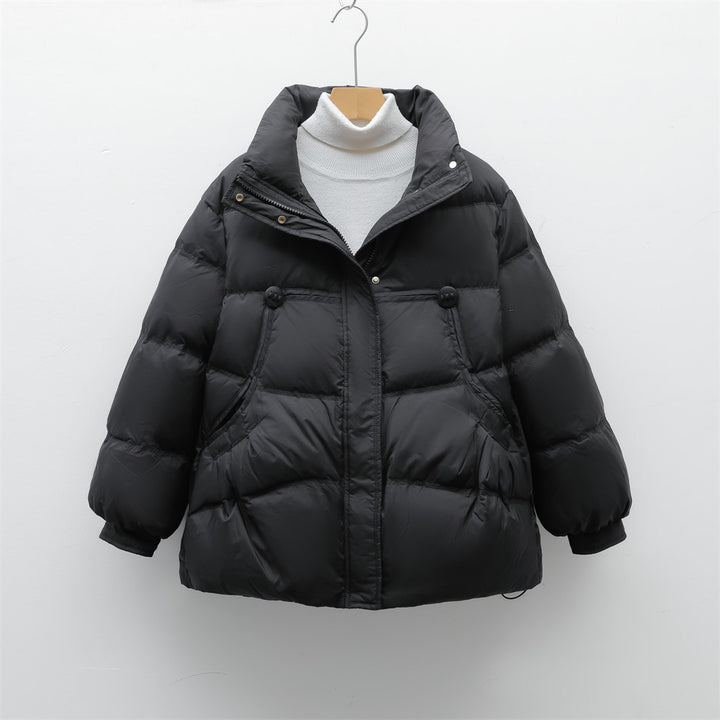 Damen voluminöse Winterjacke mit praktischen Taschen und hochschließendem Kragen Mirla-Eva Jonsson