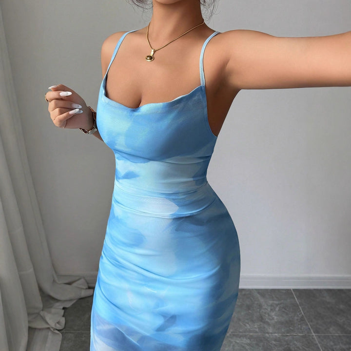 Damen wrap dress with asymmetrical cut and refined ruffle details Mirla-Eva Jonsson