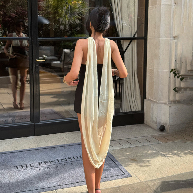 Damen wrap mini dress med spännande axelremmar och figurnära silhuett Mirla-Eva Jonsson