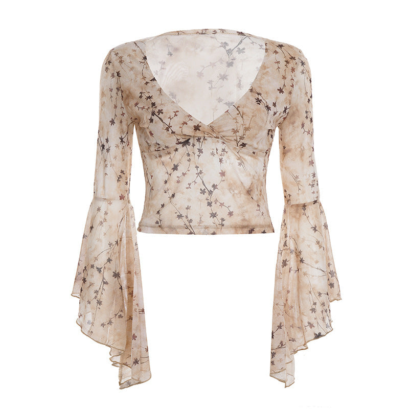 Damen wrap top med voluminösa ärmar och blommig tryck Mirla-Eva Jonsson