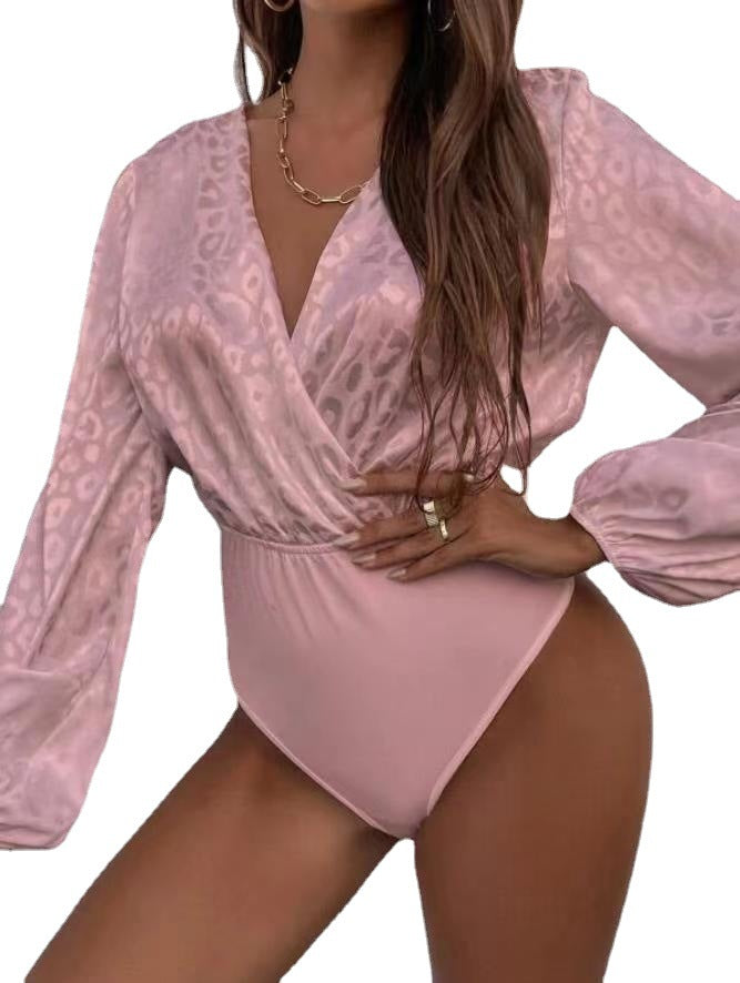 Damenbodysuit med elegant omslagsutskärning och voluminösa ärmar Mirla-Eva Jonsson