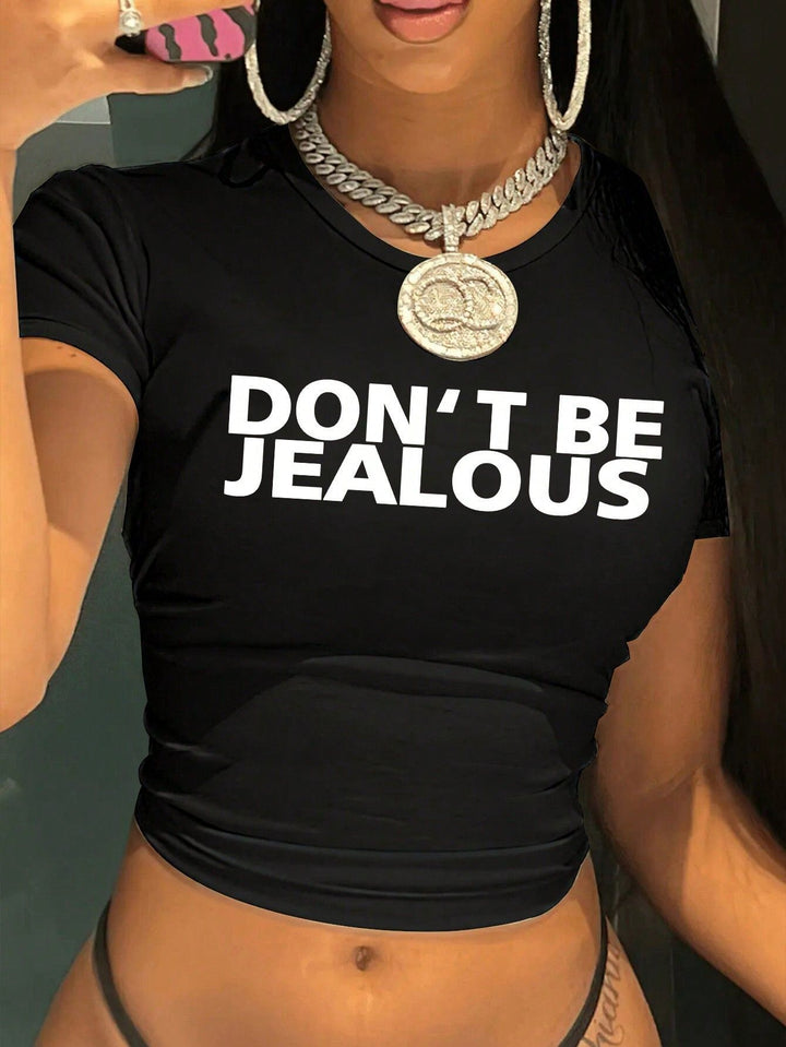 Damens Crop-T-shirt med konstnärligt statementtryck Mirla-Eva Jonsson