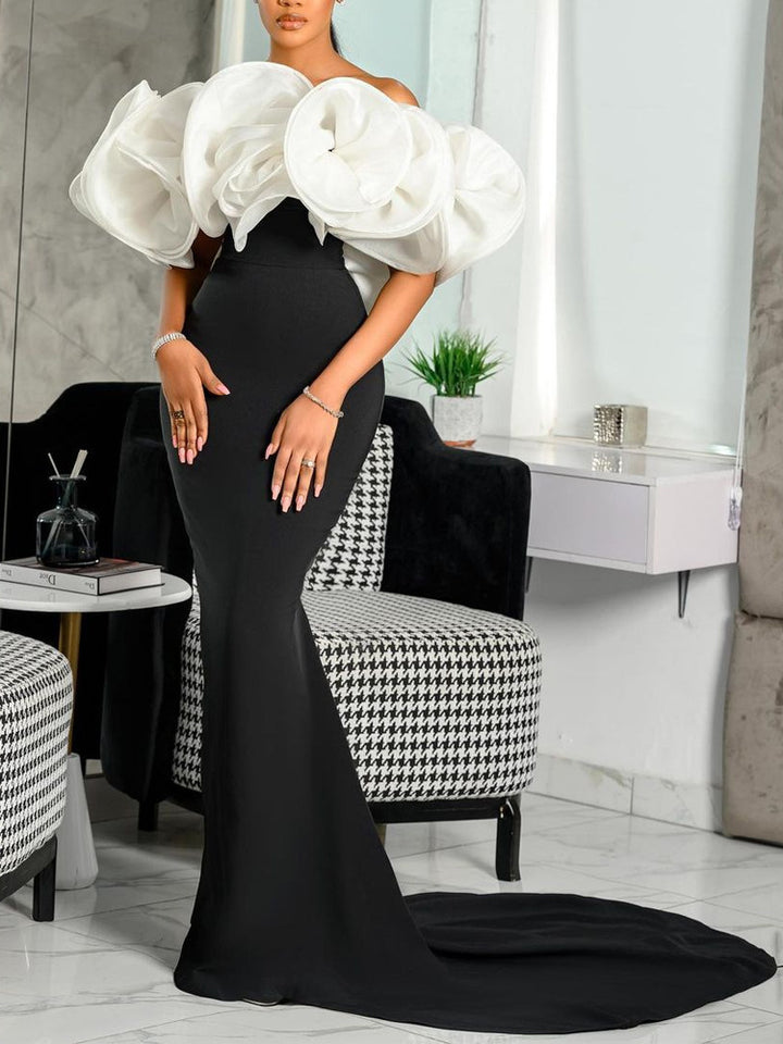 Damens Elegant Aftonklänning med Voluminös Bodice och Formsydd Kjol-Eva Jonsson