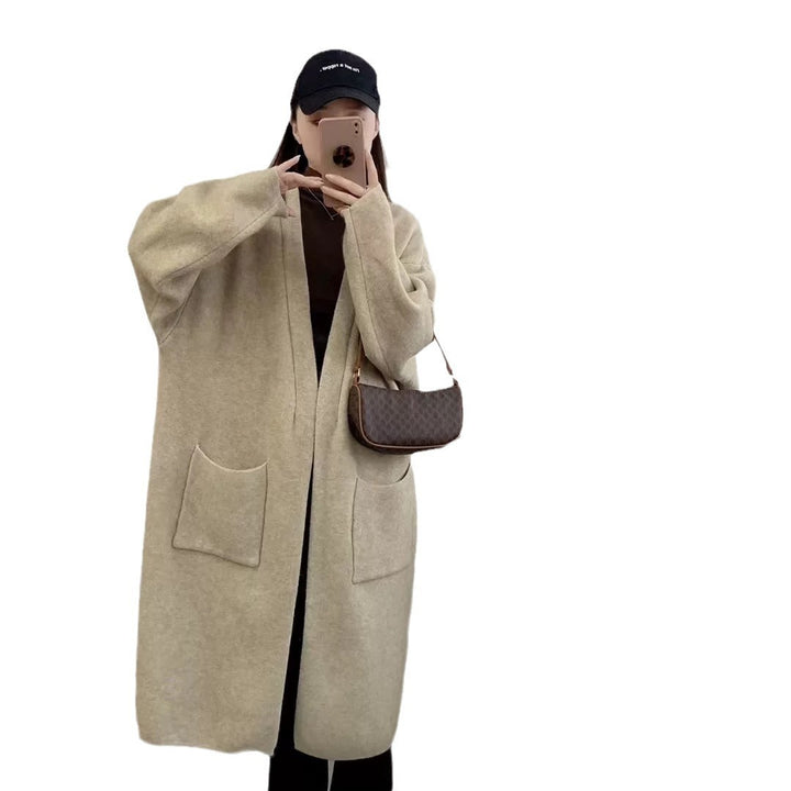 Damens Lång Oversized Stickad cardigan med praktiska fickor och breda ärmar Eva Jonsson-Eva Jonsson