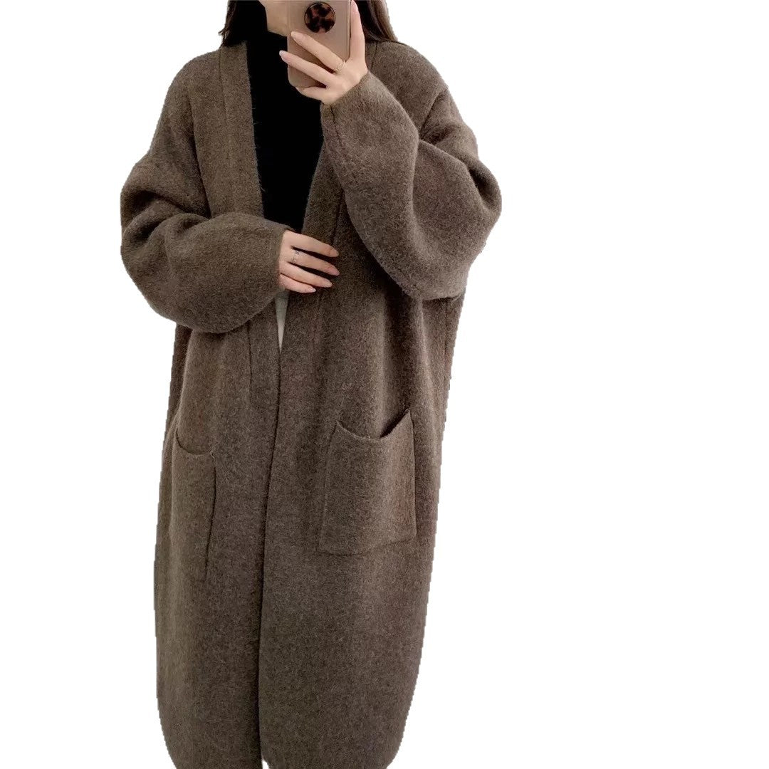 Damens Lång Oversized Stickad cardigan med praktiska fickor och breda ärmar Eva Jonsson-Eva Jonsson