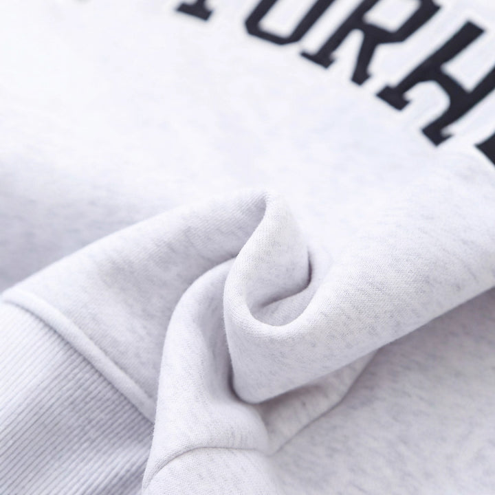Damens avslappnad sweatshirt med iögonfallande text Mirla-Eva Jonsson