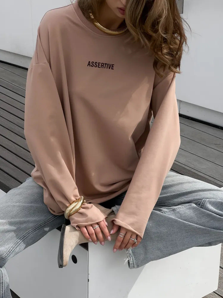 Damens avslappnad sweatshirt med modern text och oversize-snitt Mirla-Eva Jonsson