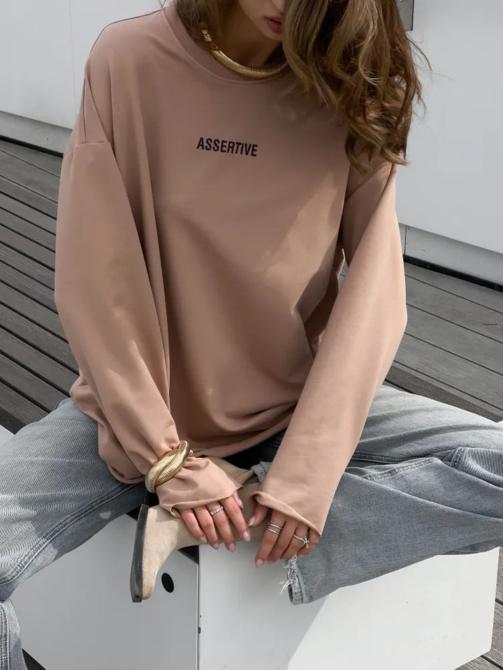 Damens avslappnad sweatshirt med modern text och oversize-snitt Mirla-Eva Jonsson