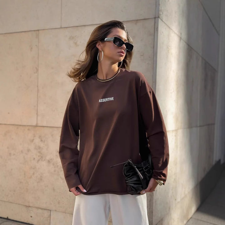 Damens avslappnad sweatshirt med modern text och oversize-snitt Mirla-Eva Jonsson