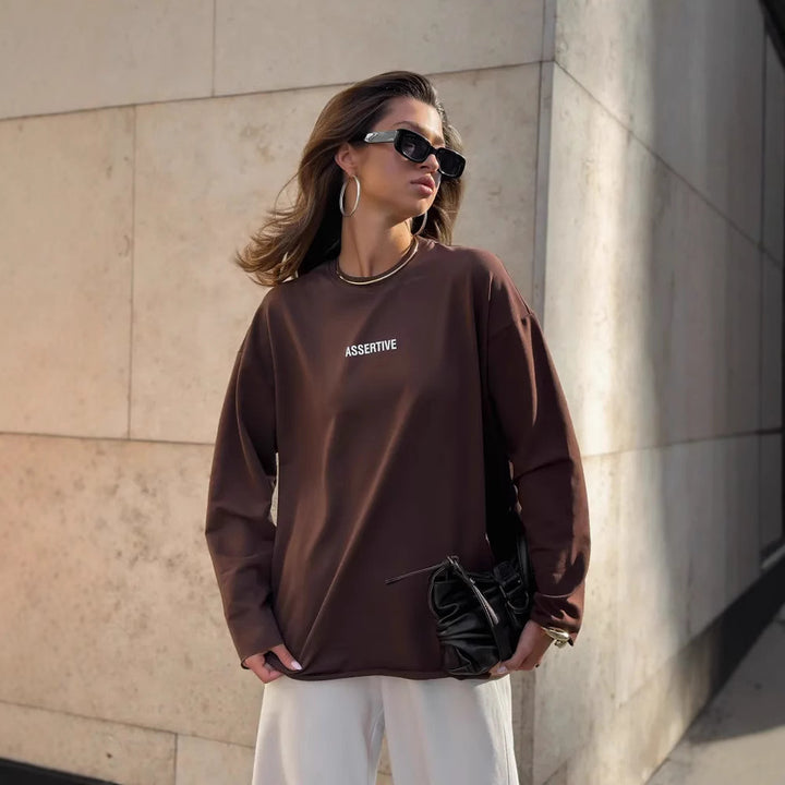 Damens avslappnad sweatshirt med modern text och oversize-snitt Mirla-Eva Jonsson