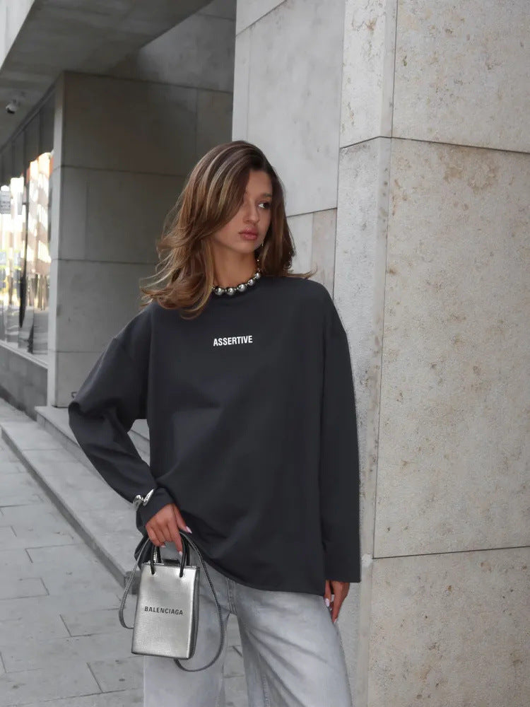 Damens avslappnad sweatshirt med modern text och oversize-snitt Mirla-Eva Jonsson