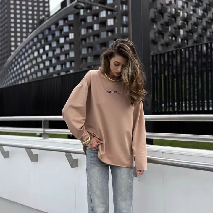Damens avslappnad sweatshirt med modern text och oversize-snitt Mirla-Eva Jonsson