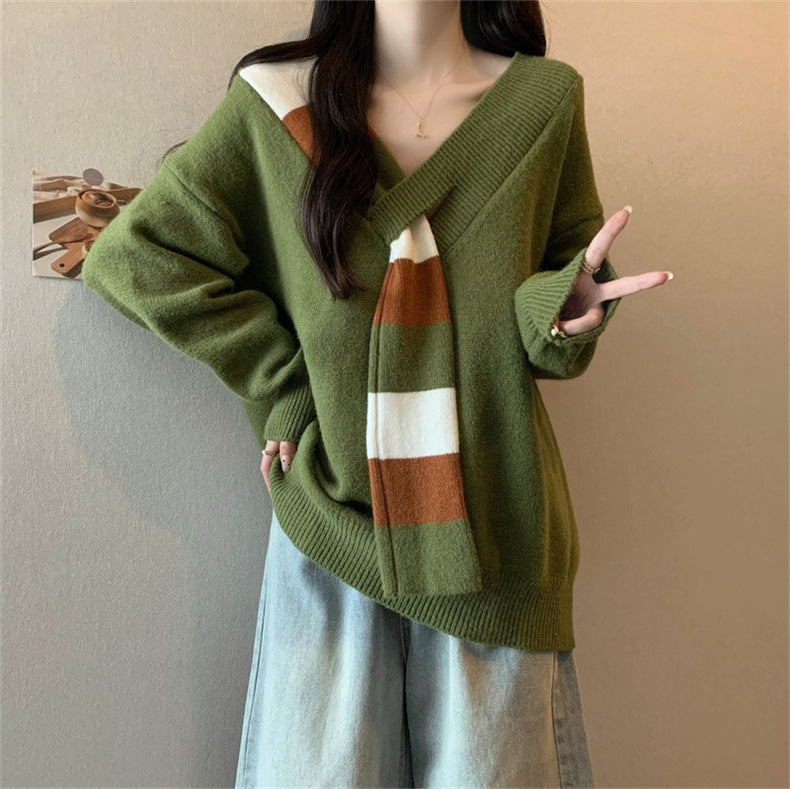 Damens avslappnad tröja med unik V-ringning och modernt färgblockdesign Mirla-Eva Jonsson