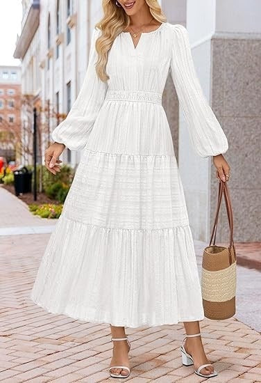 Damens avslappnade maxiklänning med ruffles detaljer och djup V-ringning Mirla-Eva Jonsson
