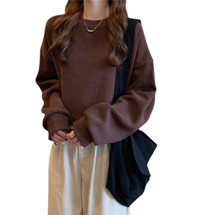 Damens avslappnade oversize sweatshirt med bekväm krage och mjuka muddar-Eva Jonsson